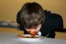 Youth participate in spaghetti eating contest